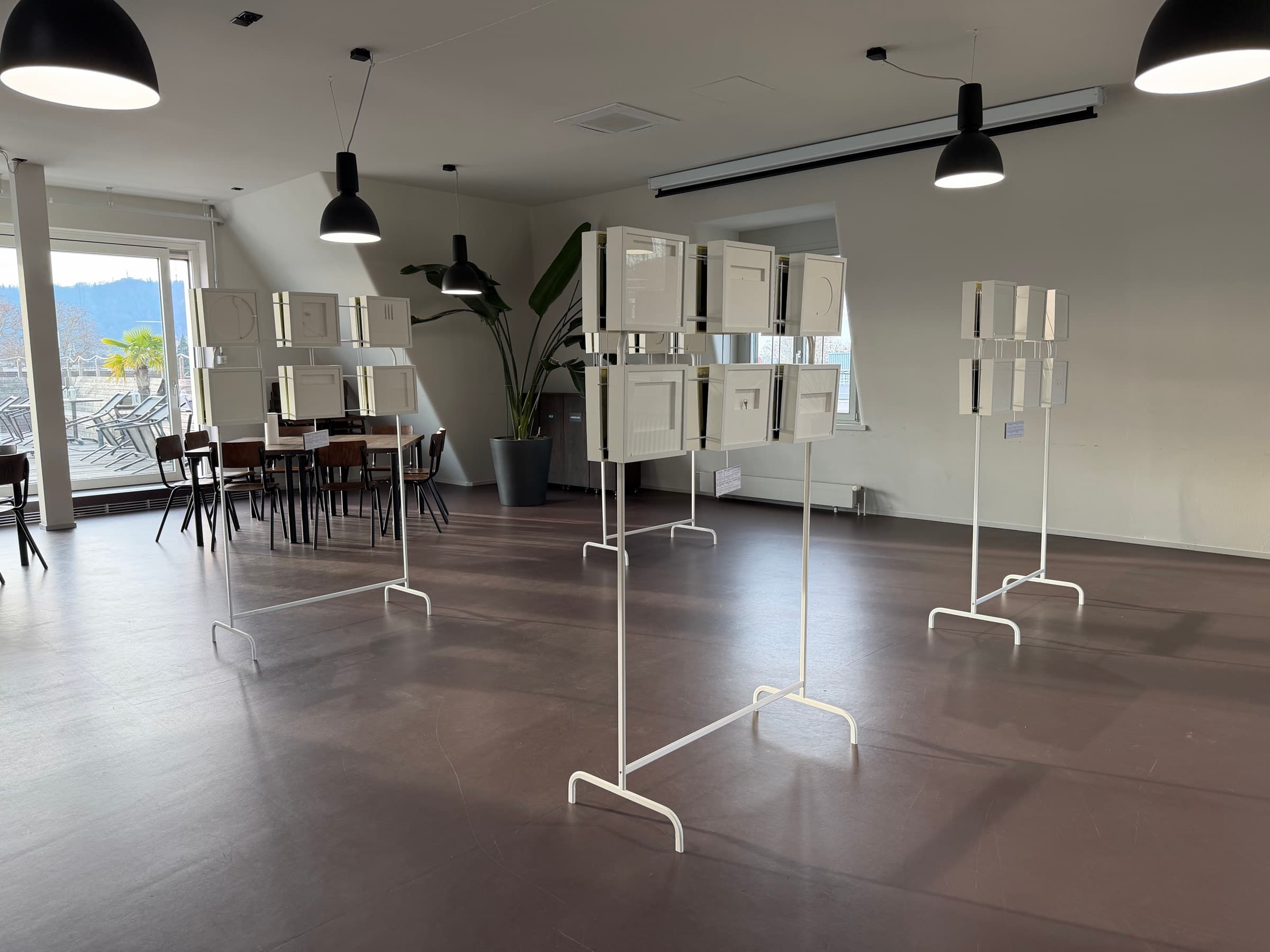 Exhibition display stands in the daylit interior